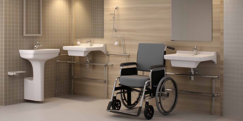 Wheelchair-accessible bathroom with grab bars and multiple sinks designed for people with disabilities